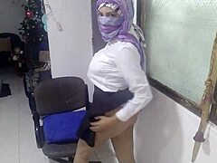 Arab wife in school outfit enjoys solo playtime