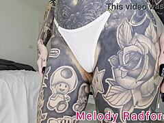 Australian mom Melody Radford flaunts her curves in a pink bikini