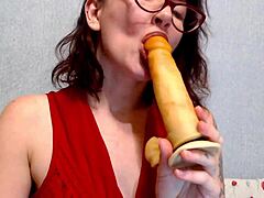 Beautiful mommy gives a blowjob to a big cock