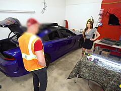 Mature woman with large breasts has sex with her automobile technician in a garage