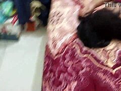 A busty married woman mounts and takes a vigorous pounding from a well-endowed partner in a desi duo